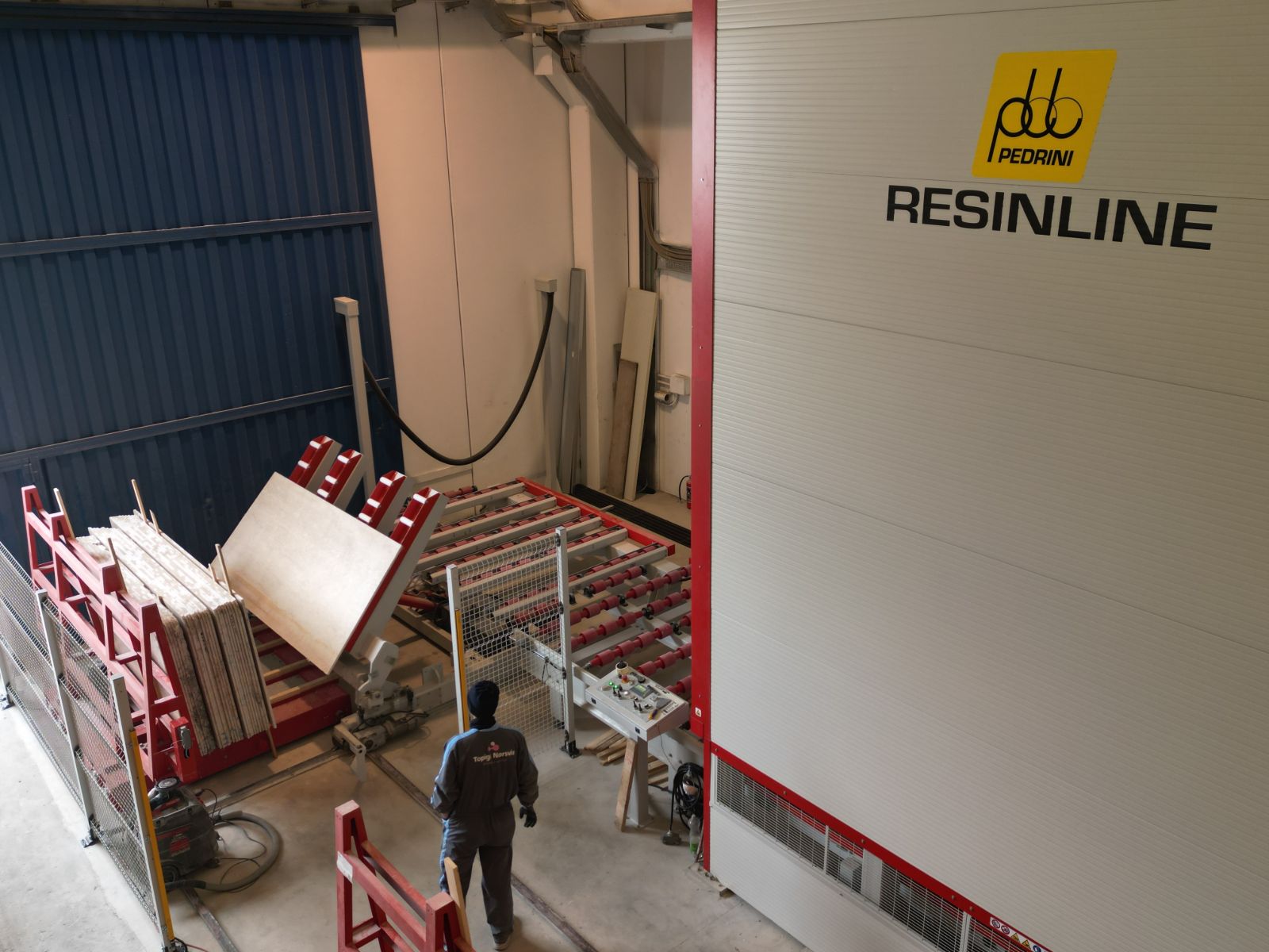 Linea di resinatura Resinline con carico lastre